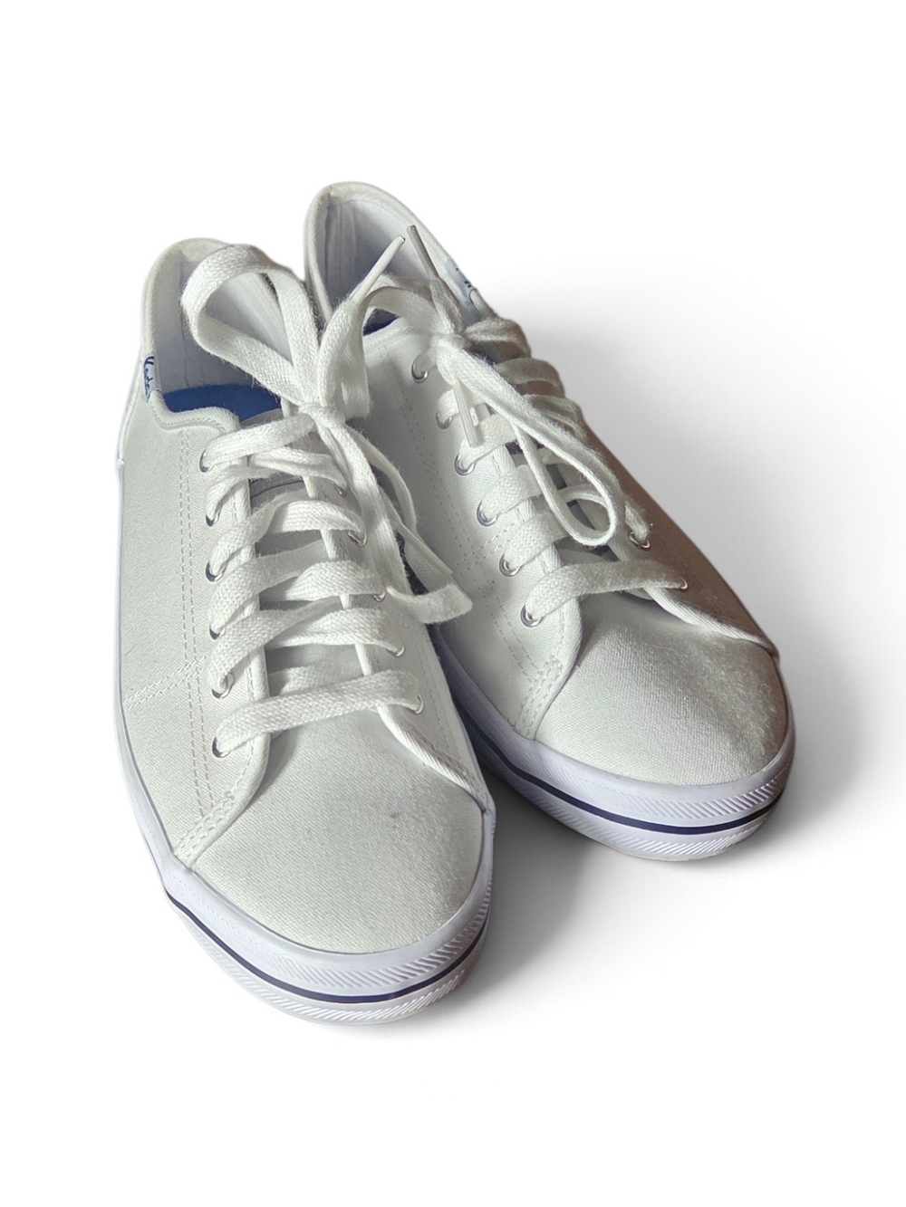 Keds Women's White Kickstart Canvas Low-Top Sneakers with Subtle Blue Trim.